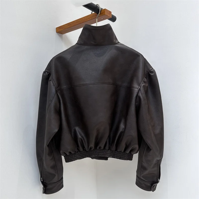 Chaqueta de cuero para mujer nueva chaqueta de motocicleta a prueba de viento con cuello levantado de invierno 2025 abrigo asimétrico de cuero Artificial para mujer