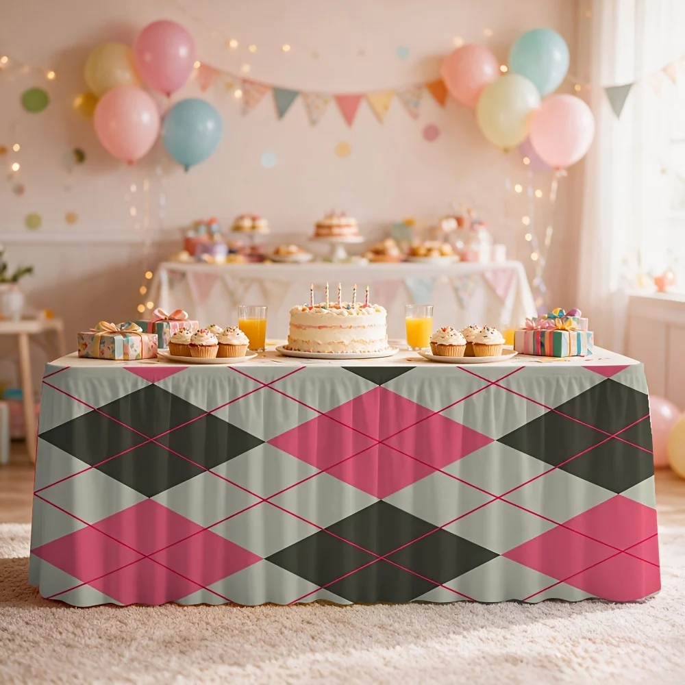 One table skirt with a Halloween theme, featuring a pink, gray and black checkered pattern.