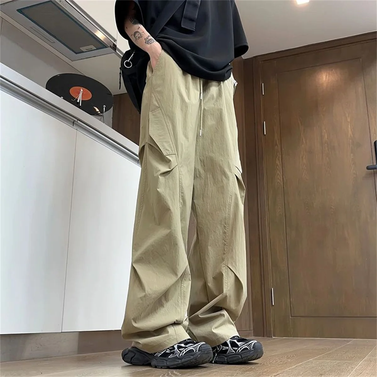 الرجال الصيف التجاعيد الحرير الجليد ثنى السراويل أنبوب مستقيم فضفاض ملابس العمل الرياضية السراويل موضة فضفاضة ومتعددة الاستخدامات سراويل تقليدية