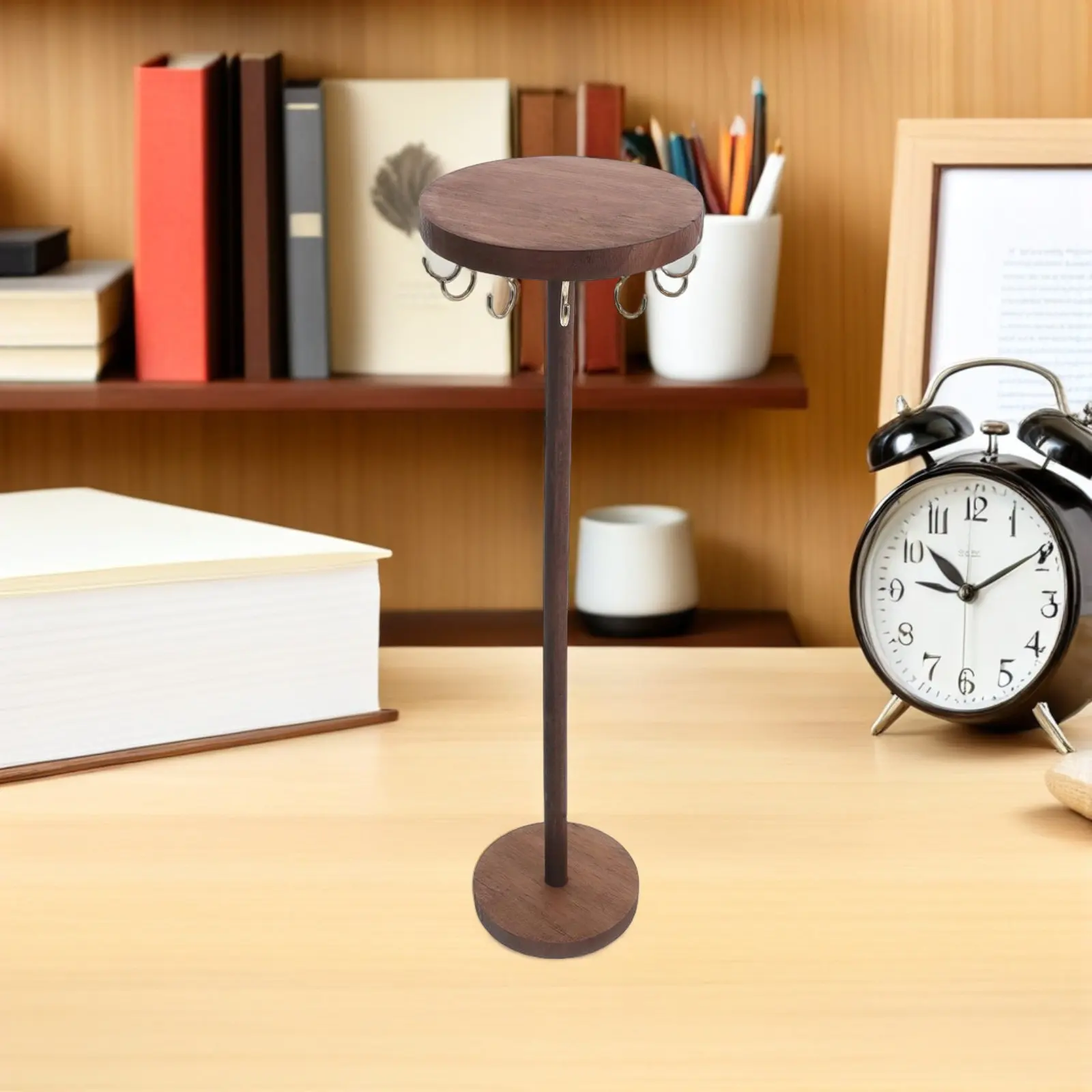 

Подставка для украшений из массива орехового дерева с круглым основанием и крючками для подвешивания колье, серег и браслетов