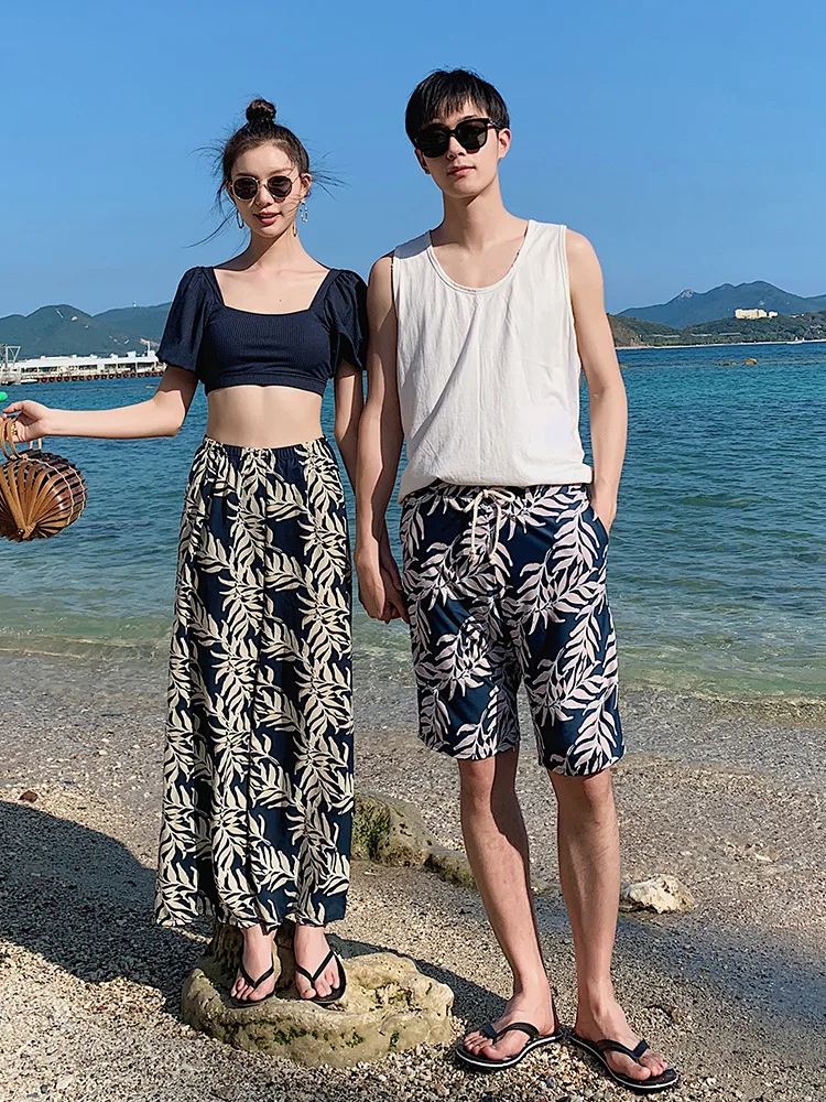 

New couple swimsuit, women's bikini three piece set, flat angle beach pants, swimming trunks, fashionable black white swimsuit