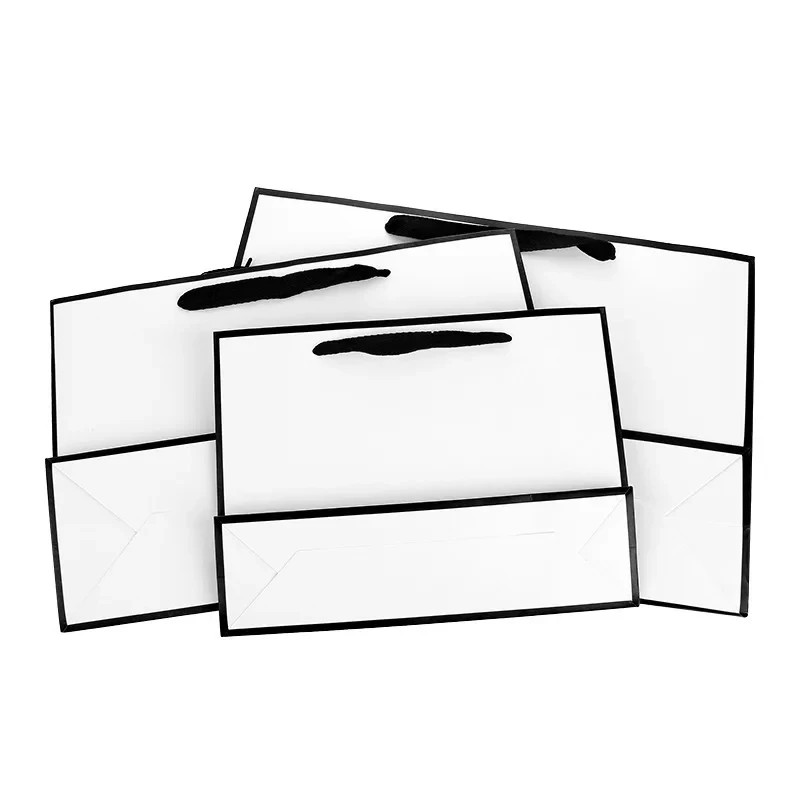 2 قطعة حقيبة تسوق عصرية بيضاء تغليف الهدايا صندوق ورقي أبيض حقيبة يد الحدود السوداء القوس مأدبة حقيبة هدايا متعددة الأغراض