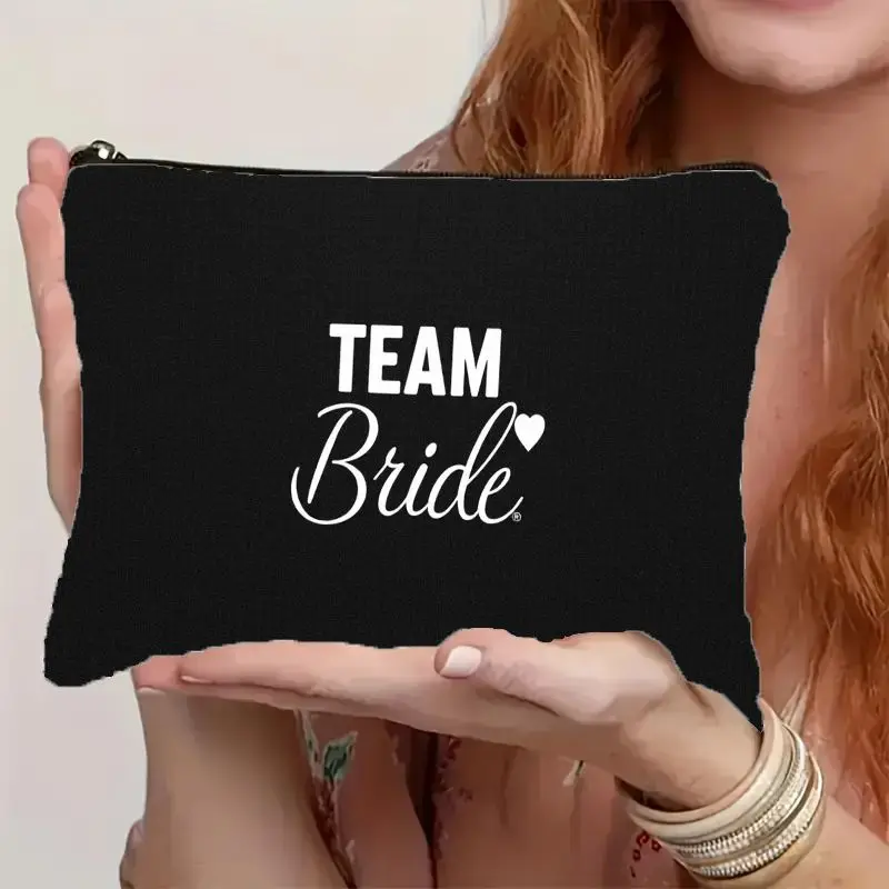 A Lightweight, Foldable Cosmetic Storage Bag For Women, Featuring A Zip Closure And 'TEAM Bride' Print, Perfect For Bachelorette