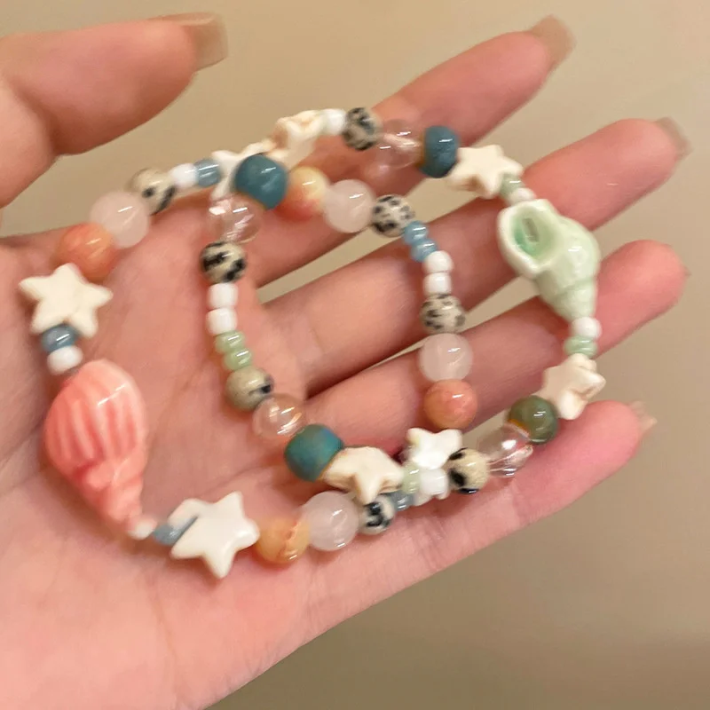 Sommerliches Armband im Ozean-Stil: Blaues Muschel-Perlenarmband für Damen mit Seestern-Anhänger, dehnbarer Armreif, Urlaubs-Strandschmuck, Ästhetik – Detail 8