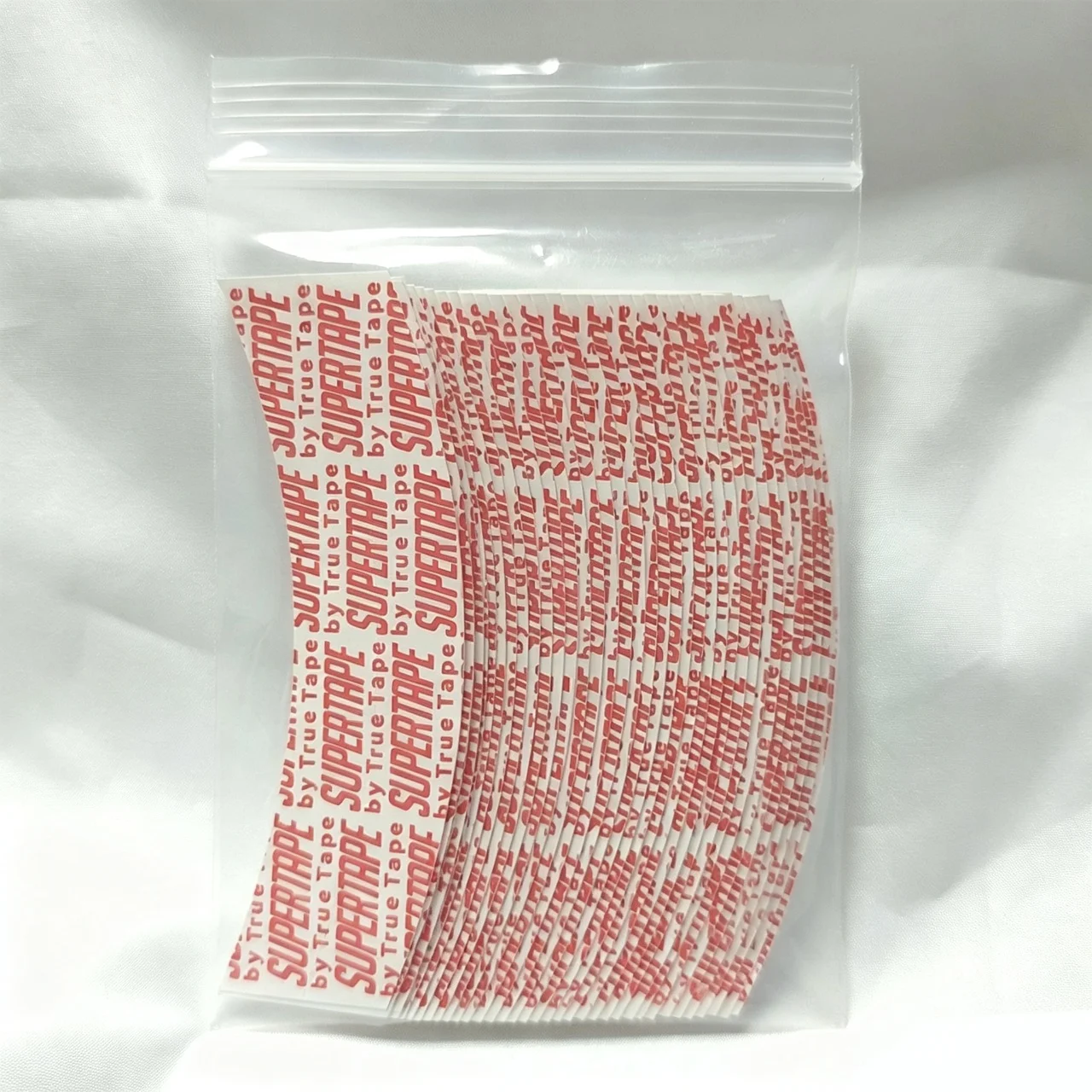 

Strong Hold Curved Wig Tape, 36 Pcs /bag- Extra Sticky Adhesive for Hair Extensions, Wig Pieces, Lace Wigs and Hairpieces
