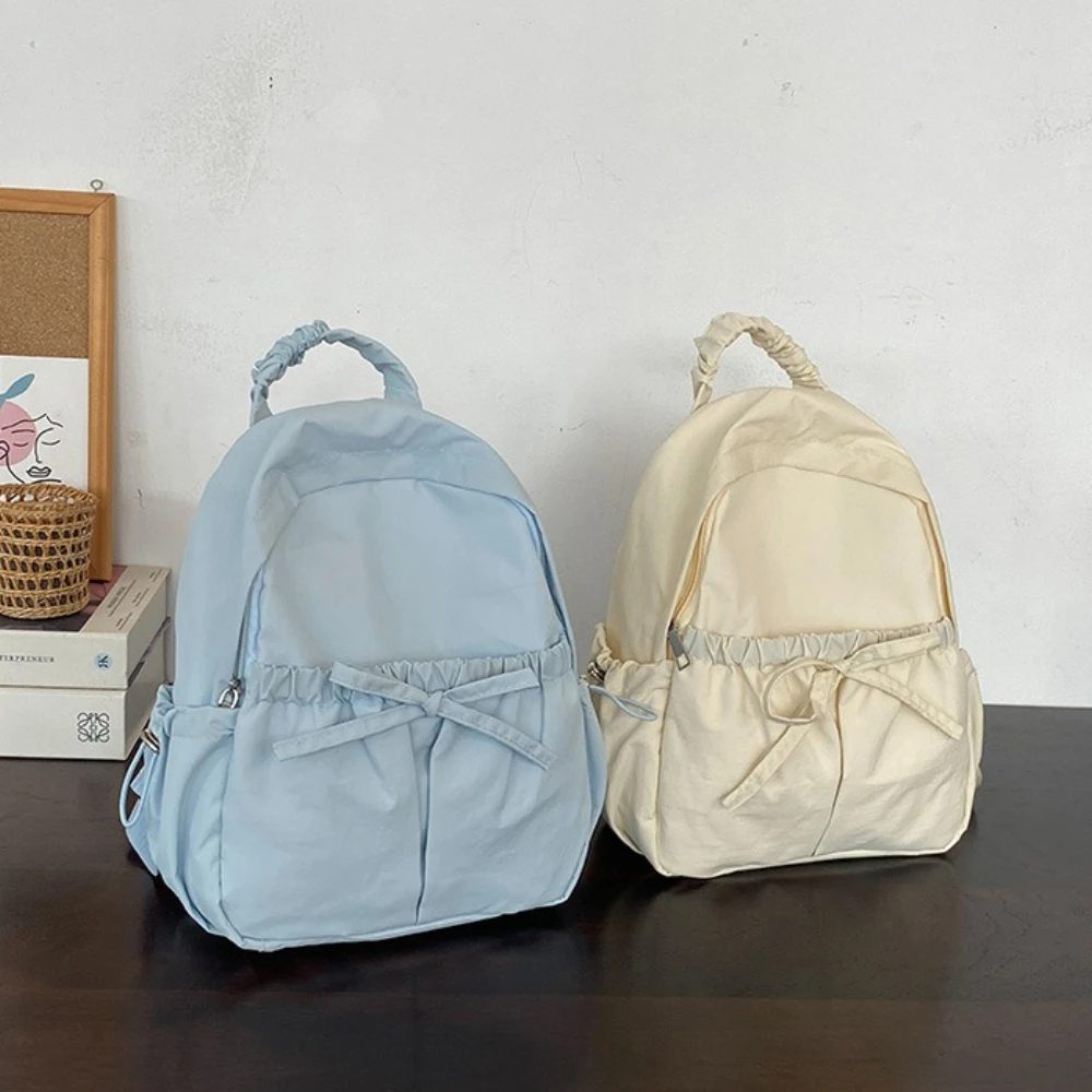 Mochila de estilo japonés para mujer, bolso ligero de estudiante de moda con lazo, mochila de viaje informal de Color sólido Simple para la escuela