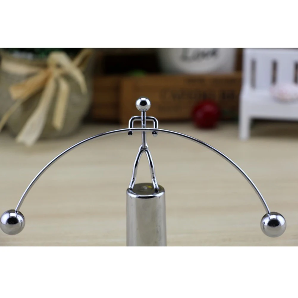 

Balanced Small Ornaments Person Rotate Law Decoration Stainless Steel Pendant