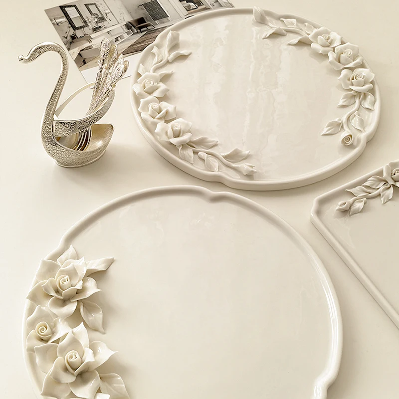 

Light luxury hand-squeezed camellia relief disc home restaurant desktop high-value dessert plate high-foot plate