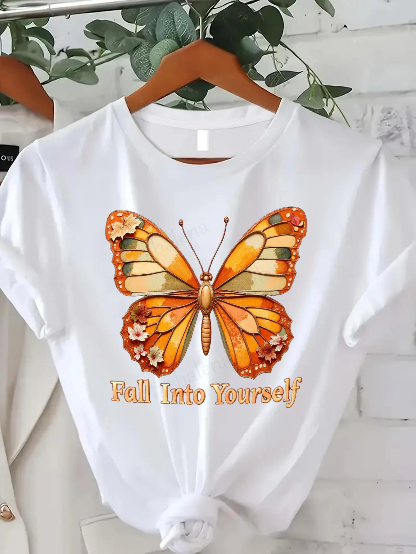 

Comfortable Women's Print T-shirt "Vibrant Butterfly 'Fall Into Yourself' Graphic Tee for Women"