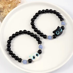1 PC Pulseras a juego Parejas Mujeres Luminoso Lindo Cat Amistad Bracelete Negro Blanco Cabeza de gato Bead Strand Pulsera 12 Bracelet de Bobinal de ventas de 12 ventas - №3