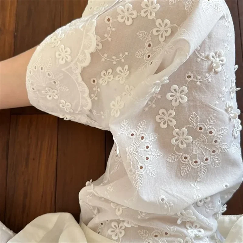 Nuovi pantaloni estivi a gamba larga moda pizzo bianco scava fuori ricamo floreale pantaloni dritti in vita elastica tinta unita da donna