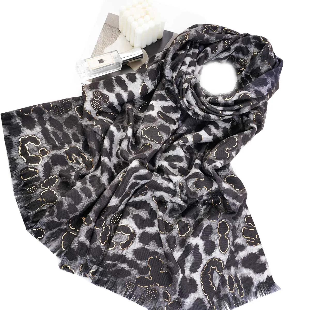 A women\'s leopard print hot stamping warm neck scarf and shawl that can be used as a daily gift