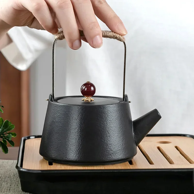 Tetera de viga de elevación de cerámica negra, juego de té de ágata Simple, olla individual Retro creativa, juego de Kungfu de cerámica, tetera para hacer té