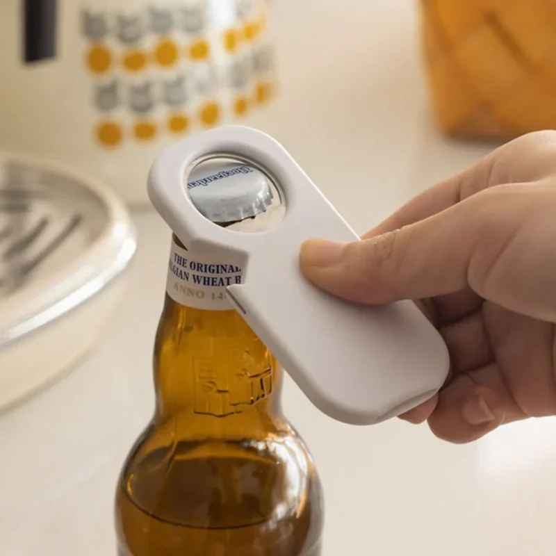 Magnetic Soda Bottle Opener- Sticks to Metal Surfaces, Opens Everything | Compact & Lightweight Design White Kitchen Helper Too