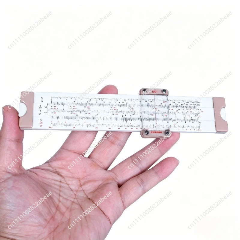 Nostalgic old object old-fashioned logarithmic slide rule 196070s old object folk ornament calculator is not new