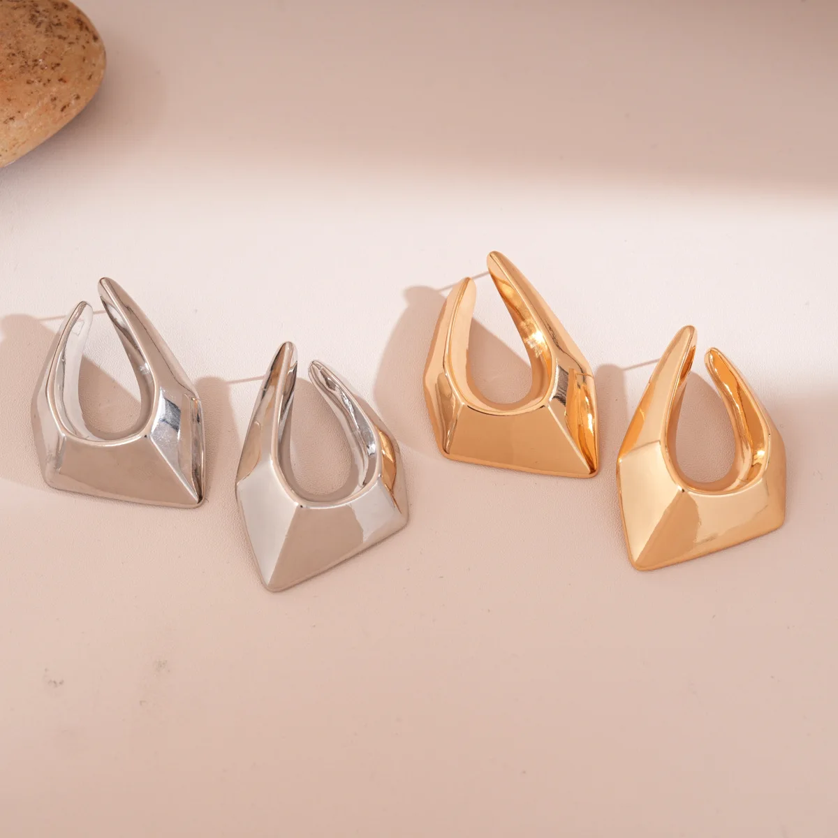 Exaggerated irregular hollow triangular stud earrings light luxury high-end earrings fashion versatile temperament earrings