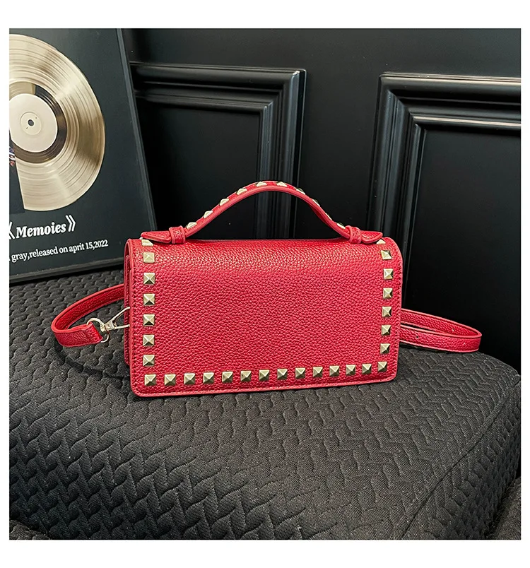 

Sweet and cool girl-style handbag woman 2026 new high luxury design rivet small square bag cross-body bag for women