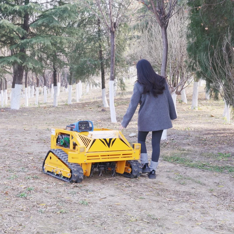 

Индивидуальная гусеничная газонокосилка с дизельным дистанционным управлением 2026, сверхмощная гусеничная газонокосилка для наклона, горного грубого теря