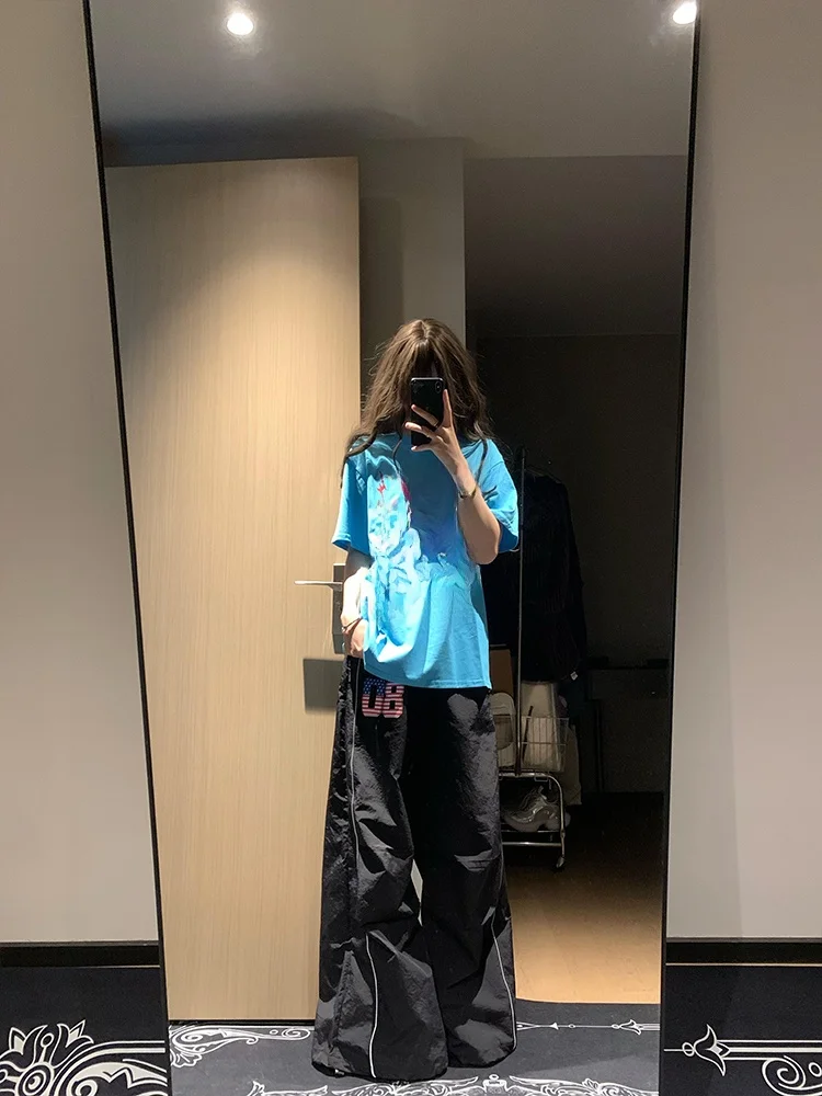 カジュアルなアメリカンスタイルのゆったりとしたプリント入りTシャツ、女性用、夏の最新作、シンプルでトレンディなブルーのカップル向けトップス