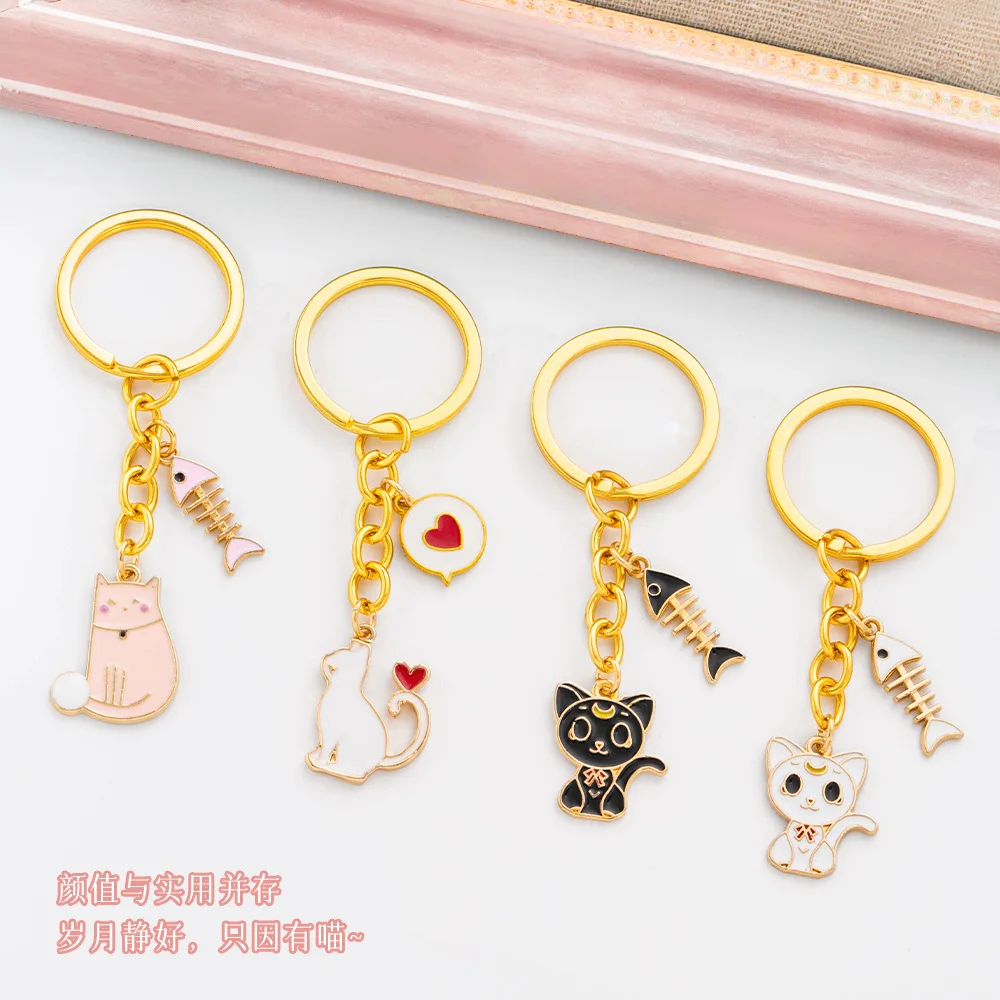 Metal keychain, cat and dog pet keychain pendant, round cute footprint key chain, heart backpack pendant