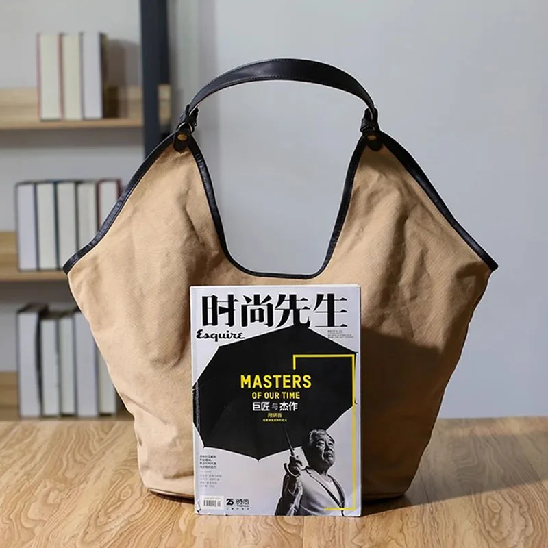 AETOO This artistic, retro and simple commuting canvas tote bag is a versatile, large-capacity, niche single-shoulder handbag fo