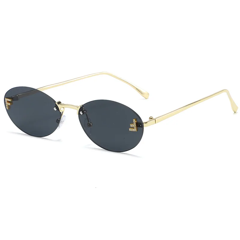 

Elliptical Diamond Studded Sunglasses with Female Letter "F" Frameless Sunglasses