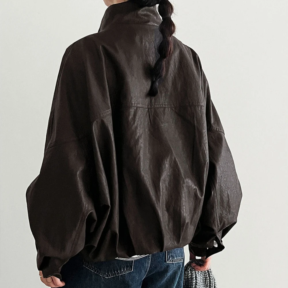 TWOTWINSTYLE الصلبة تقسم جاكيت زيبرا الإناث الوقوف الرقبة طويلة الأكمام فضفاضة كول الشارع الشهير المرأة السترات الخريف موضة جديدة