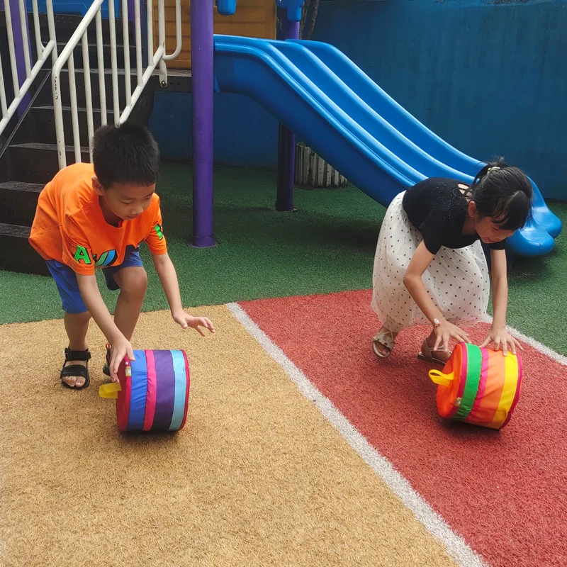 Rueda de arcoíris para jardín de infantes, estaca de ciruela multifuncional, sujeción de piernas para niños, salto de rana, transporte, equipo de adiestramiento al aire libre