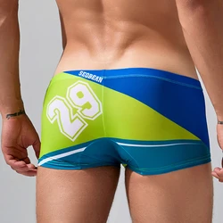 Men's boyshort fashion letter printing boyshort breathable ice silk men's underwear 3D small bag shorts without trace.