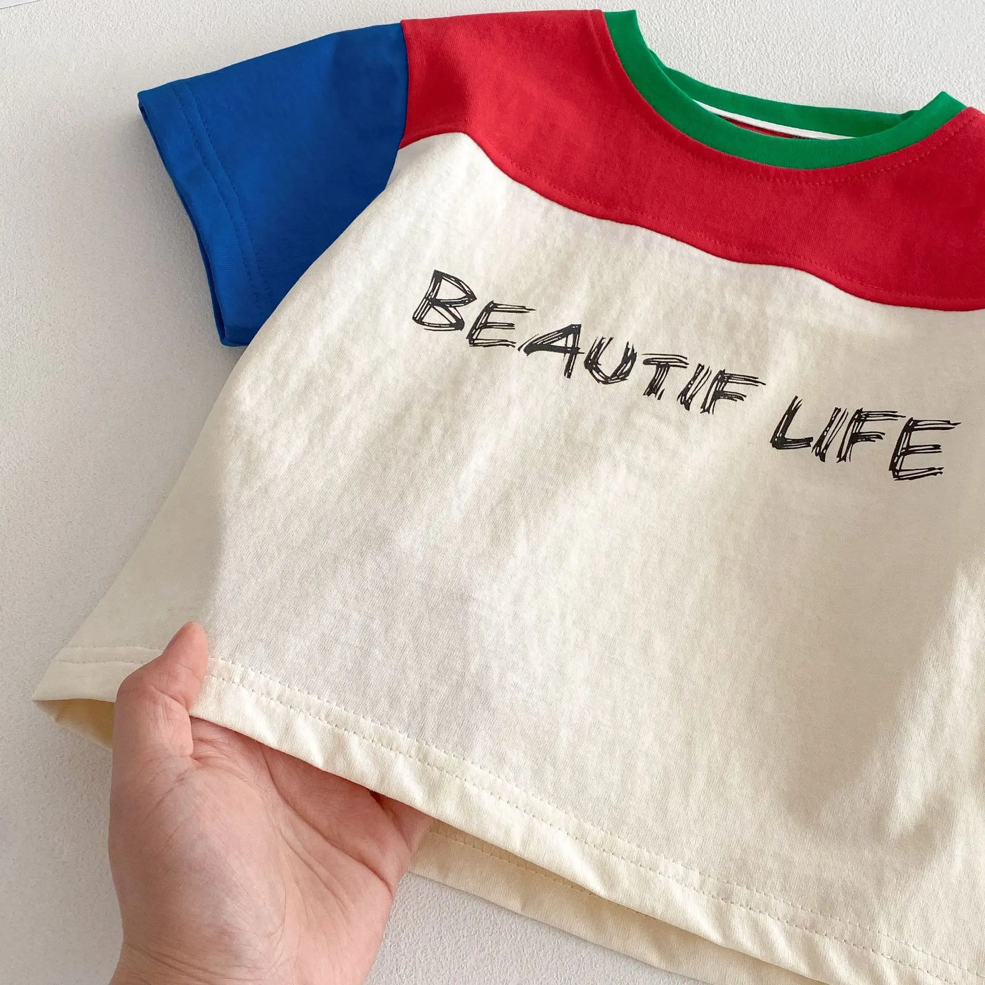 T-shirt 2025 new summer boys' fashionable base shirt thin baby Korean version color blocked short sleeved top