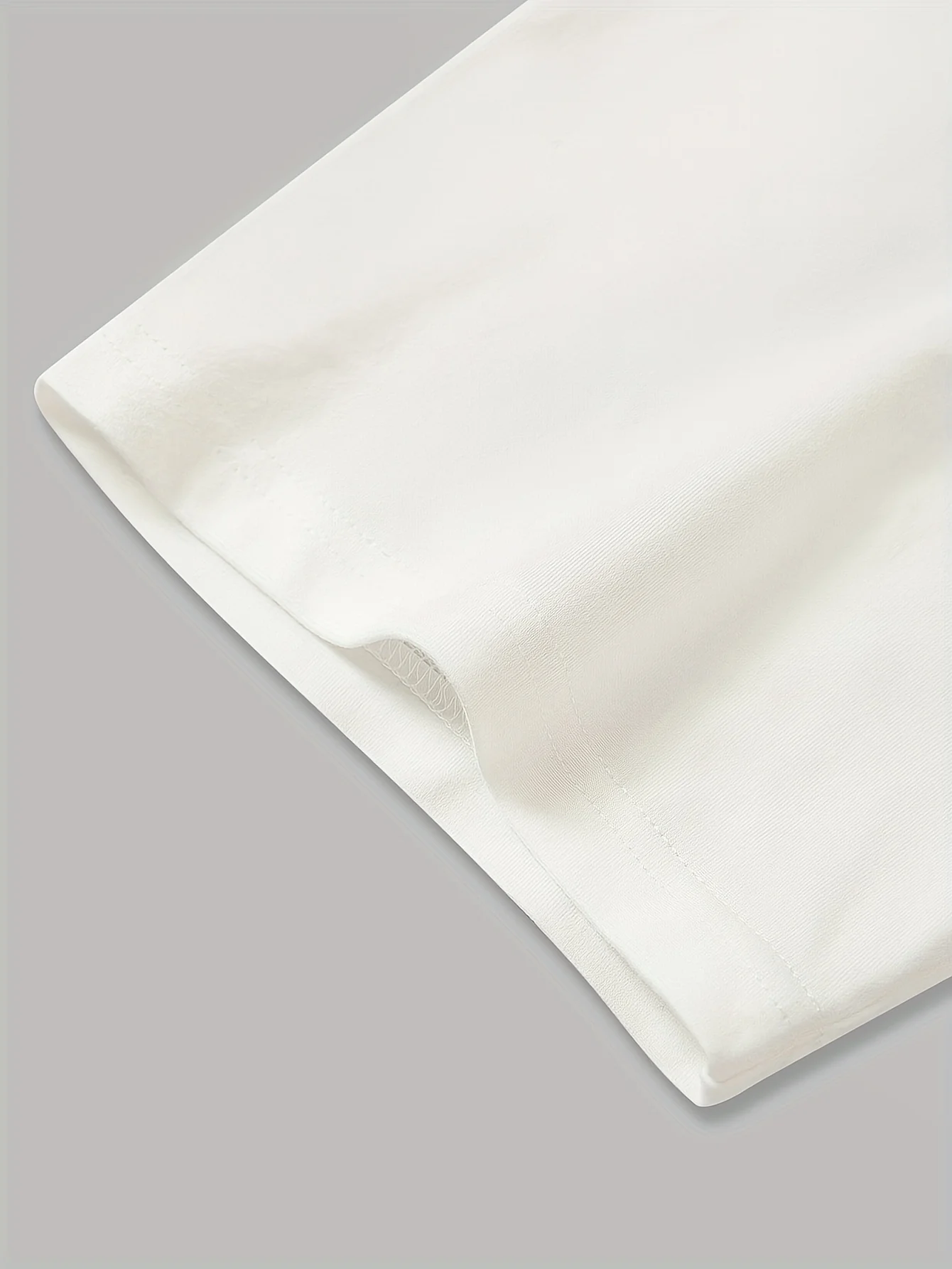 تي شيرت نسائي كاجوال فضفاض مناسب لعيد الميلاد سانتا كلوز مع طباعة نصية "أخبرني ما تريده حقًا".