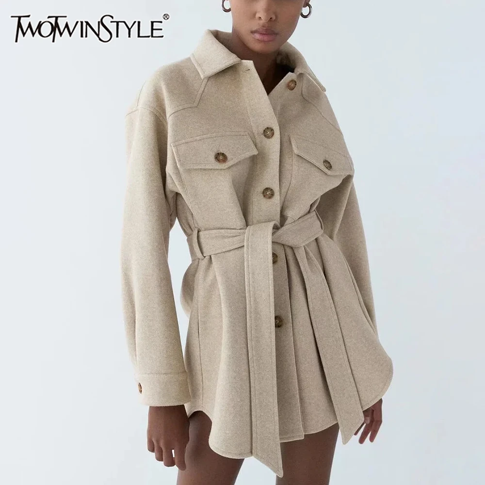 TWOTWINSTYLE Solid Spliced Belt Minimalsit Jackets For Women Lapel Long Sleeve Patchwork Single Breasted Casual Coats Female New