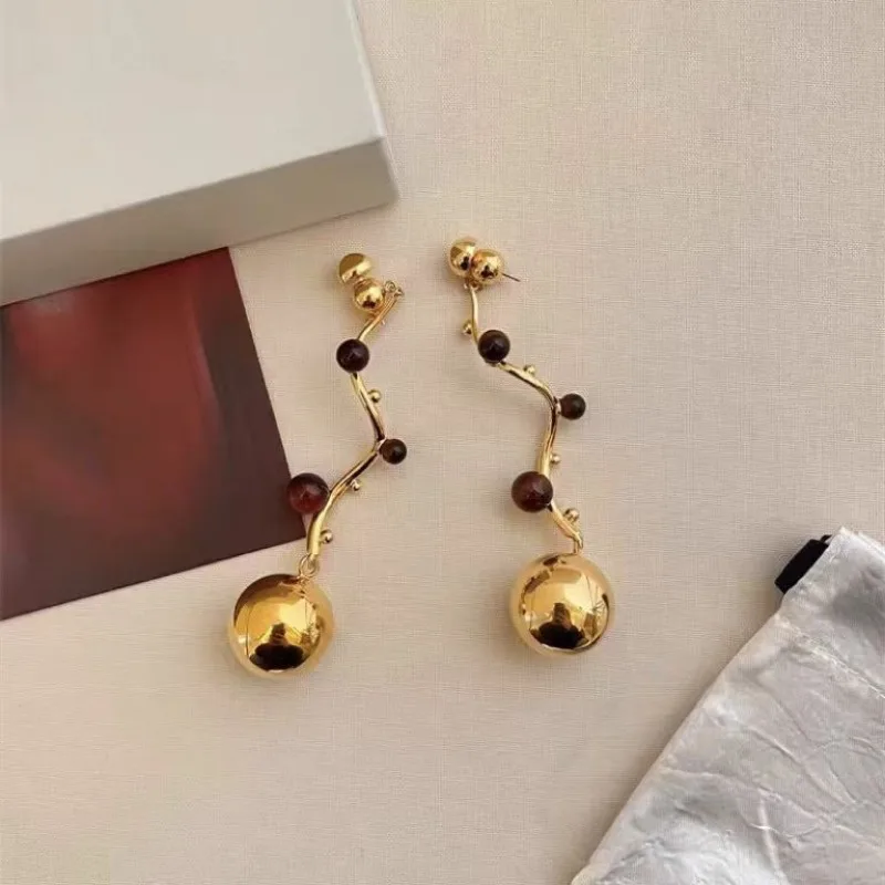 

Cold Style Fashion Irregular Metal Earrings Silver Needle High-end Earrings Niche Tiger's Eye Stone Light Luxury Earrings