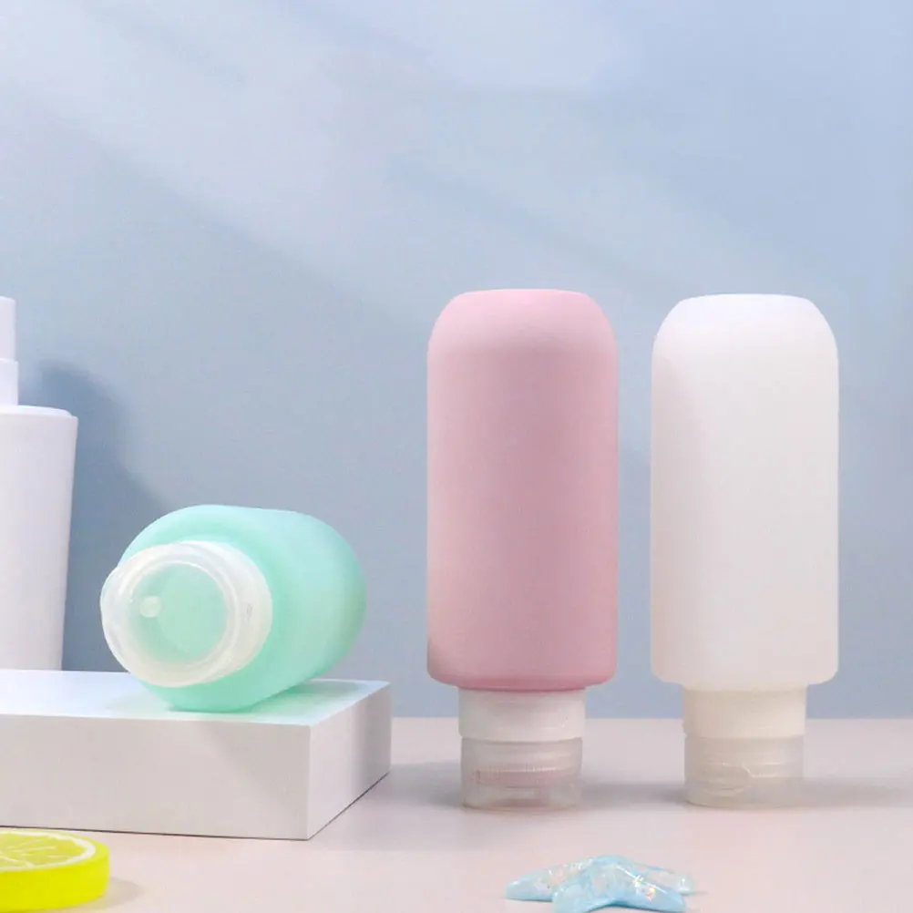 

2pcs Travel Shampoo Conditioner Bottles Portable Leak Proof Silicone Refillable Lotion Containers for Toiletries Household