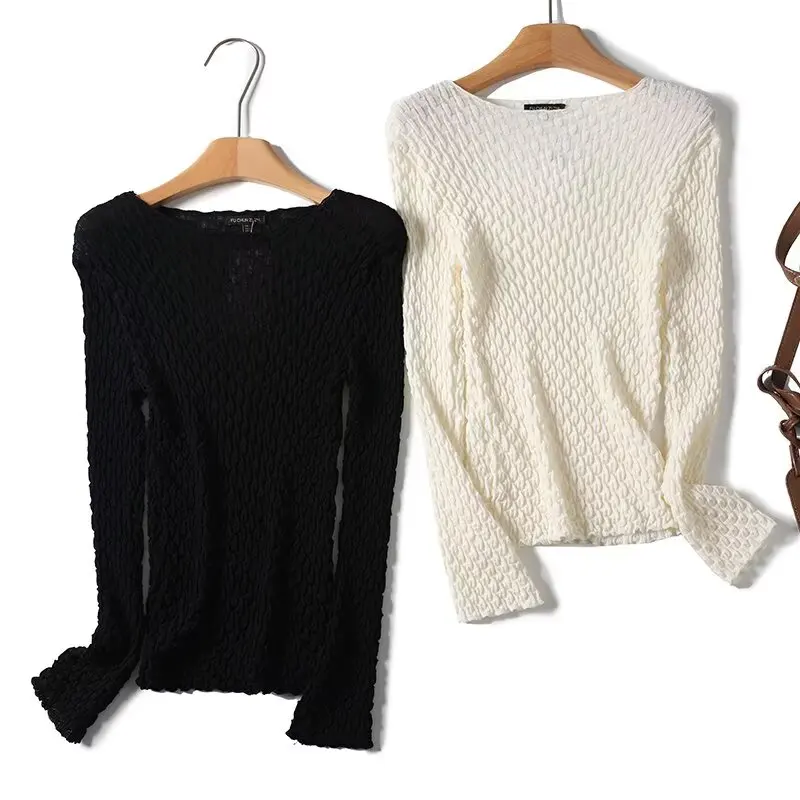 

Women 2025 New Fashion Micro-penetrating texture and internal Knitted Sweater Vintage Long Sleeve Female Pullovers Chic Tops