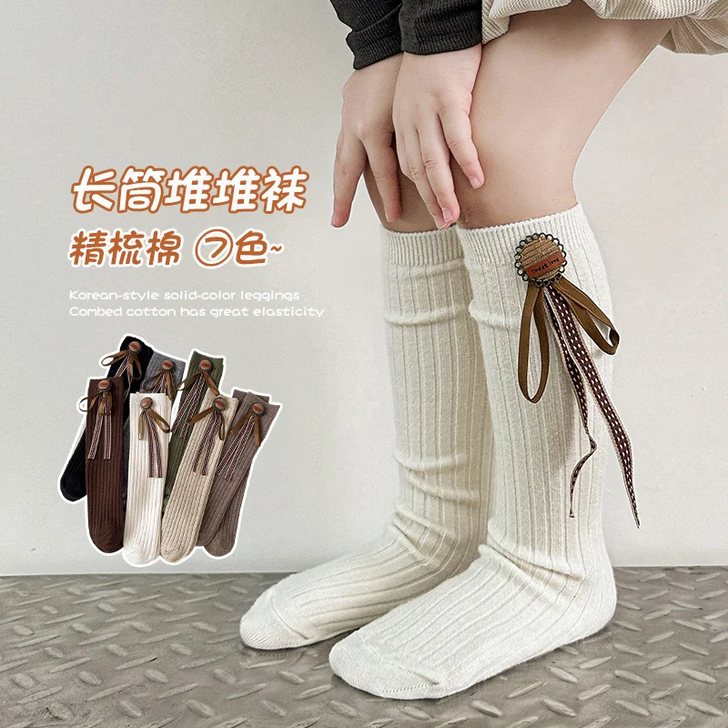 Girls Solid Color Knee-high Socks With Medal Ribbon Decor Wide Striped Design Soft Elastic Stackable Socks For Daily Cute Outfit