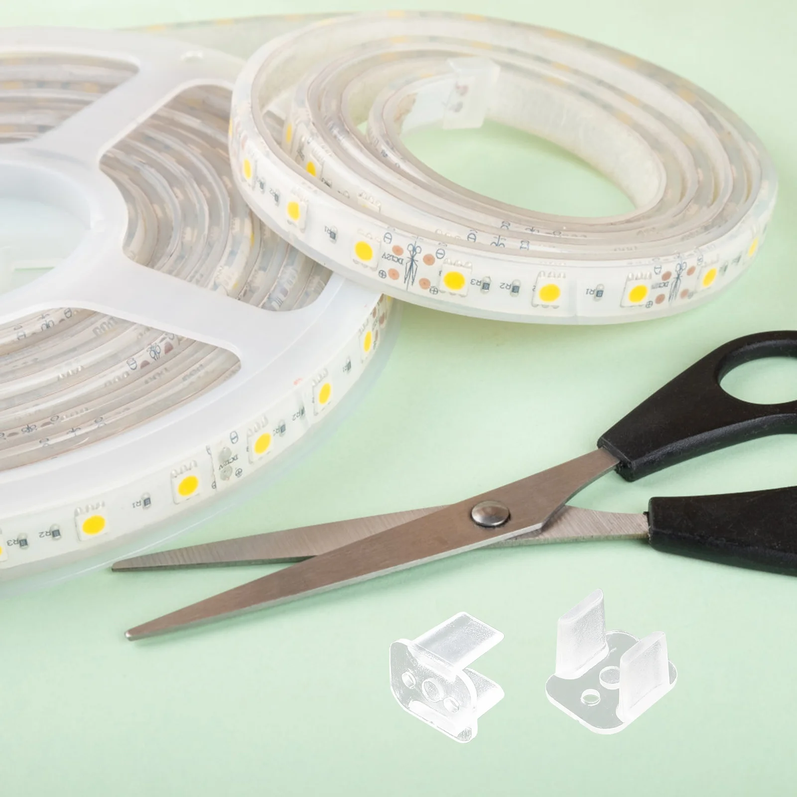 

100Pcs Lamp Strip Clips LED Clips Plastic Fixing Mounts for Strip Light Protection Stable Hold No Screws Included