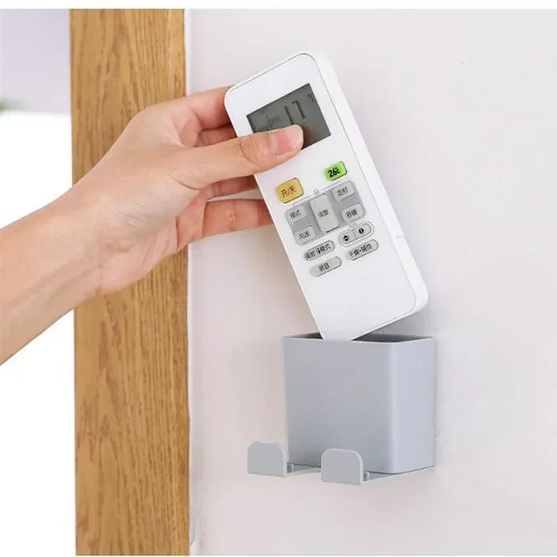 1Pcs Hanging Wall Holder Mounted Phone Smartphone Storage Rack Mobile Phone Wall Holders Remote Control Charging Holder