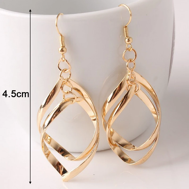 New Spiral Women\'s Hook Earrings Hollow Twist Geometric Statement Long Hanging Earrings Wraped Oval Metal Pendants Earrings