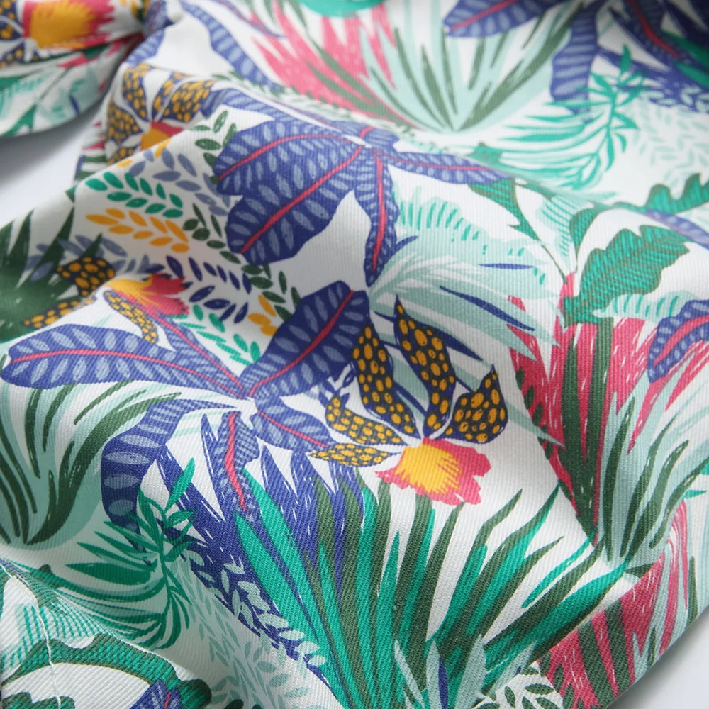 Pantaloncini di jeans elasticizzati con stampa digitale da uomo pantaloni da equitazione con fiori di piante tropicali di moda per l'estate