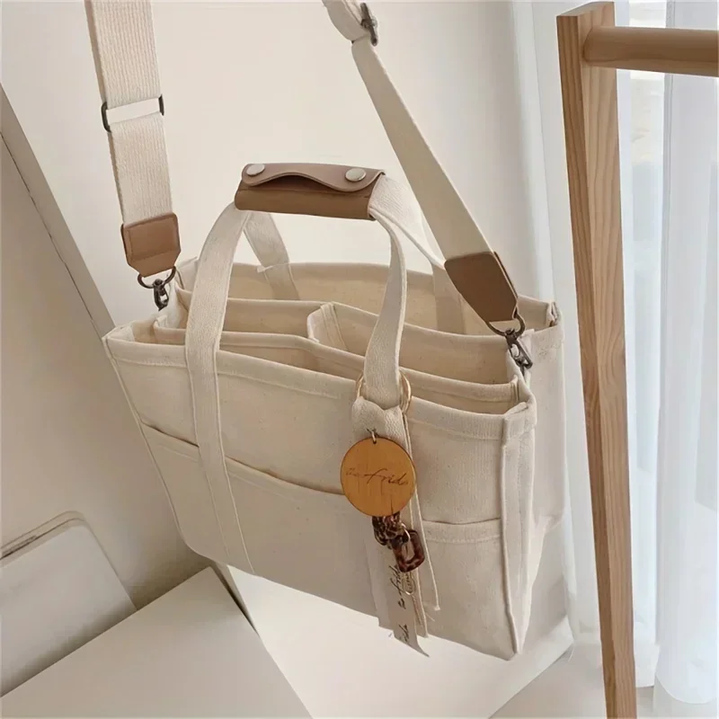 XXXXX Stijlvolle multifunctionele damesdraagtas Grote capaciteit Moeder- en babyschouder Cross-body canvas tassen