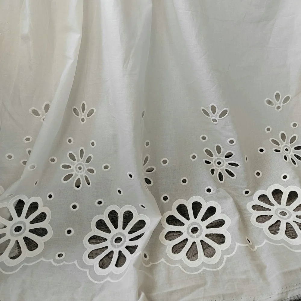 

High quality hollow cotton embroidery lace fabric, suitable for dresses wedding dress garments DIY material hollow flower fabric