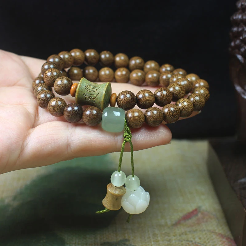 

Браслет с двойной петлей из золотистого сандалового дерева диаметром 8 мм, украшенный узлом из зеленого сандалового дерева и дизайном с шестью иероглифами-мантрой, унисекс.