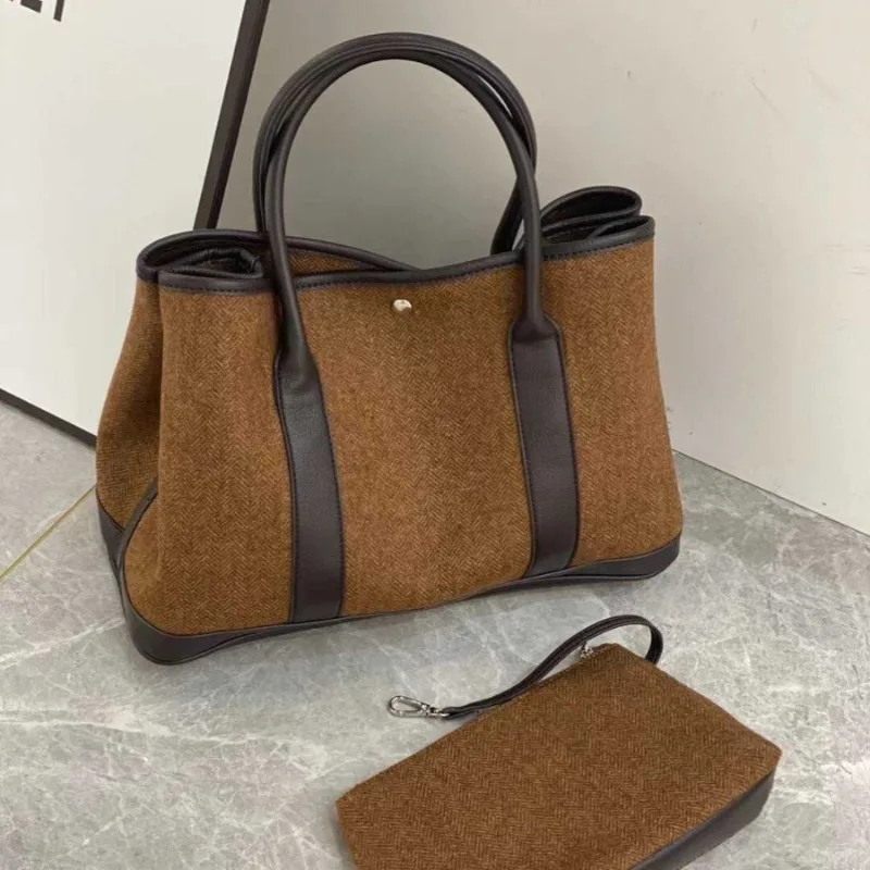 2024niche designer's new women's bag with fashionable temperament, woolen one shoulder handbag, simple and elegant versatile bag