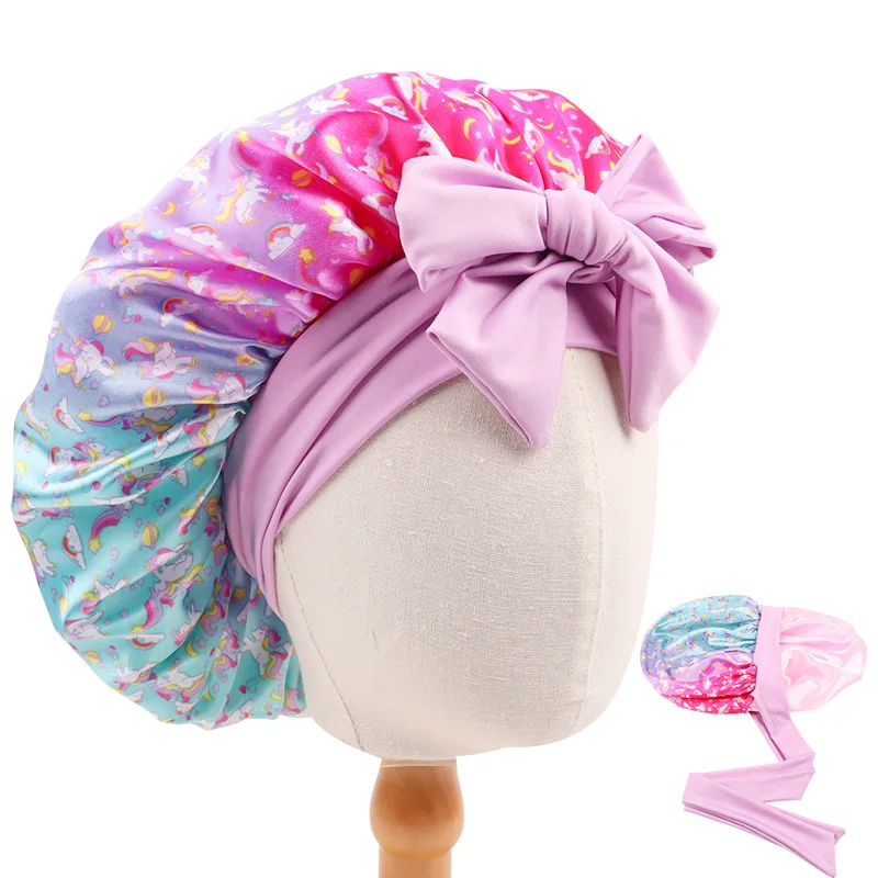 touca-de-banho-para-bebe-dupla-face-com-laco-longo-estampa-etnica-para-meninos-e-meninas