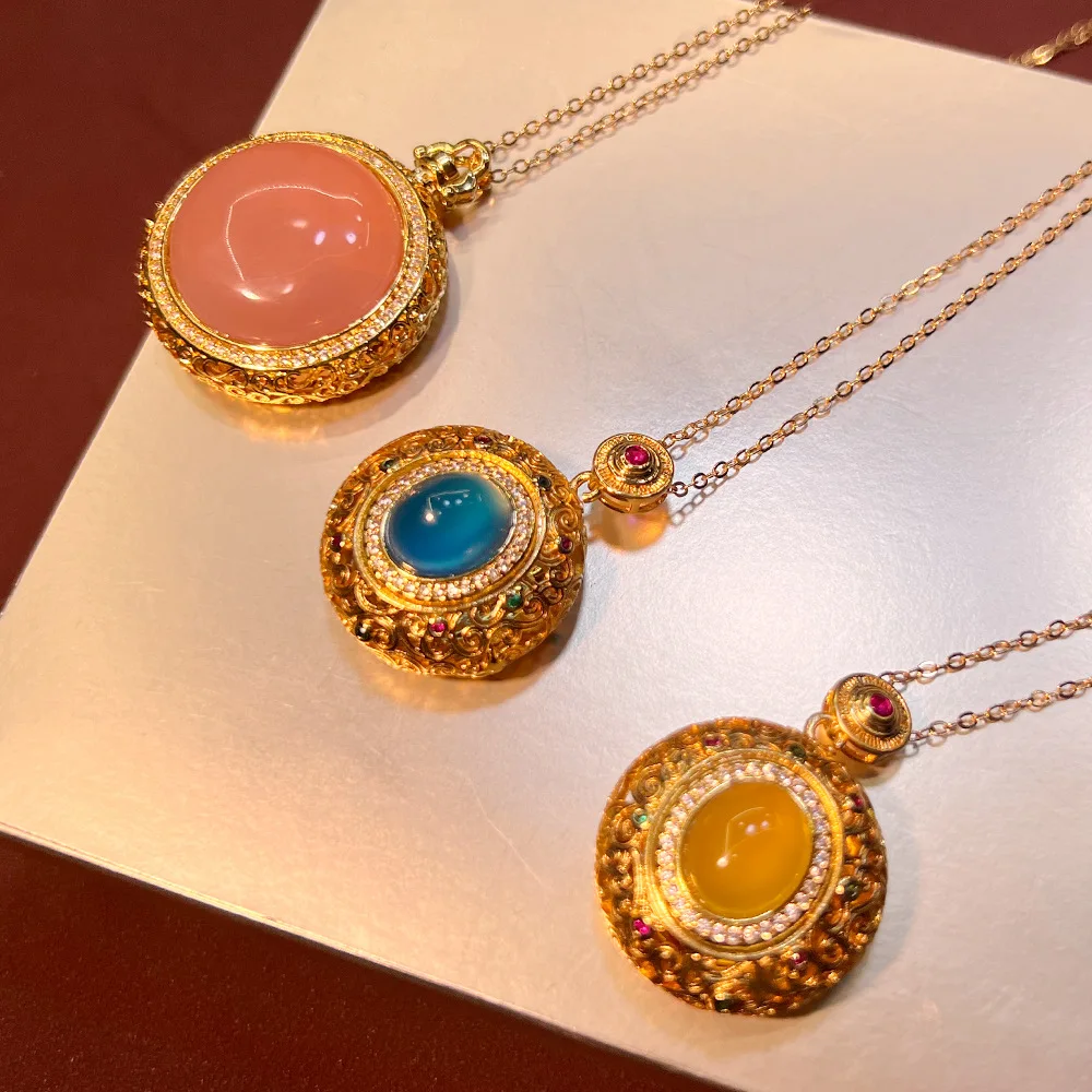 

New Chinese style noble rouge powder chalcedony pendant, retro relief copper capital real gold court style colored jade national