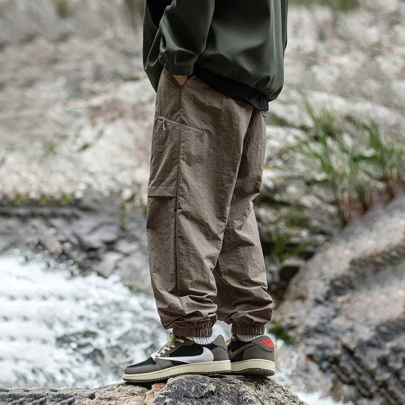 TFETTERS Autumn Men Cargo Pants 2026 Multi Pocket Waterproof Solid Color Casual Pants 100% Nylon Outdoors Tourism Men Clothes