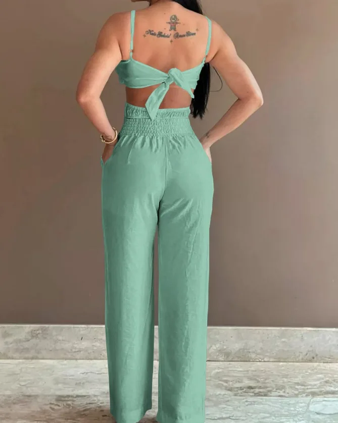 Jumpsuit wanita pola bunga Suspender kasual modis tanpa lengan kantor elegan ramping warna Solid kaki lebar musim panas