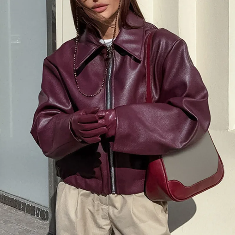 EAEOVNI الشارع الشهير سترة جلدية PU المرأة موضة بلون التلبيب سحاب أكمام طويلة معطف قصير موضة الخريف الشتاء جديد
