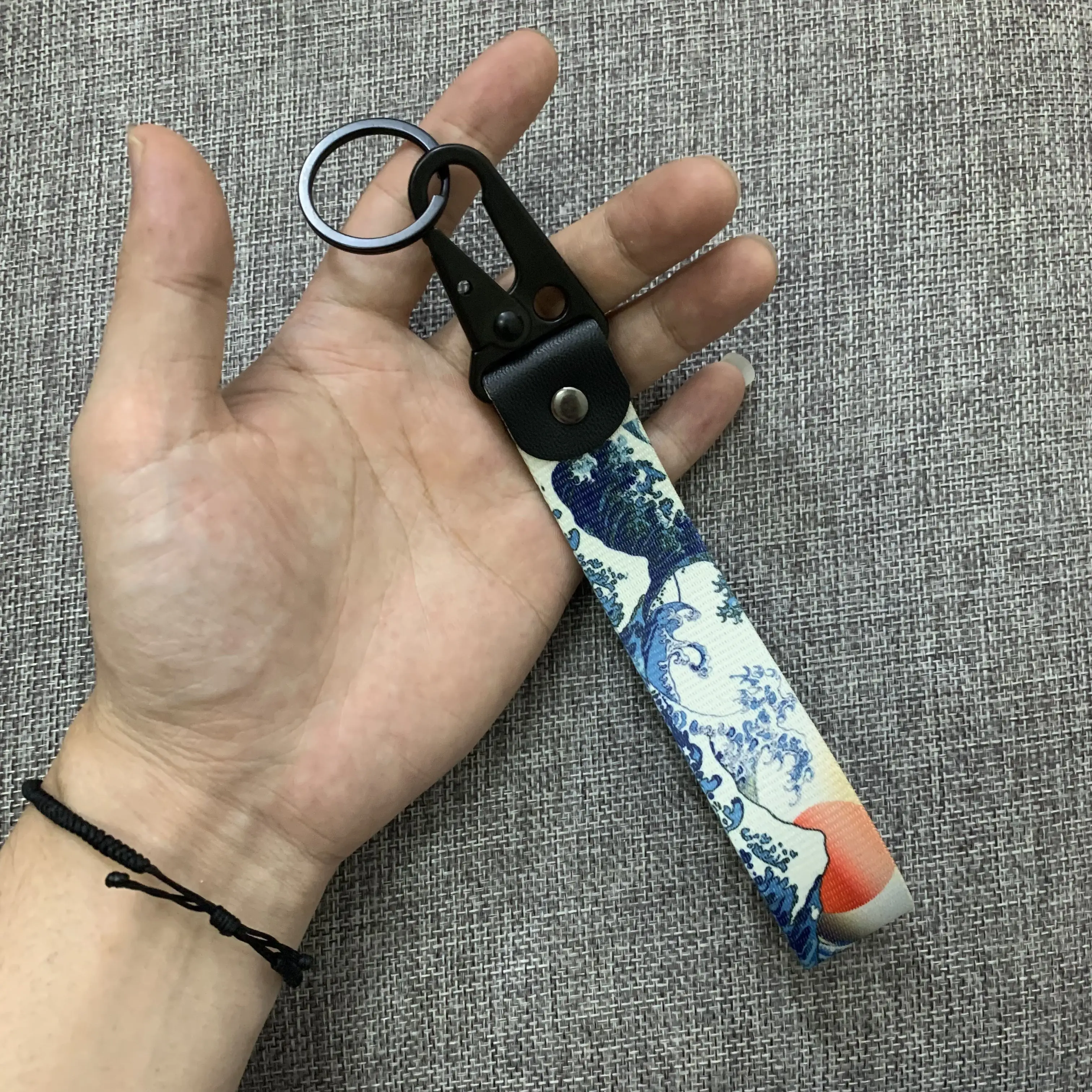 Llavero con patrón de onda y pico de águila para coche, llavero de montañismo, motocicleta, bicicleta, tejido con ventilador de coche, llavero de muñeca, 1 unidad